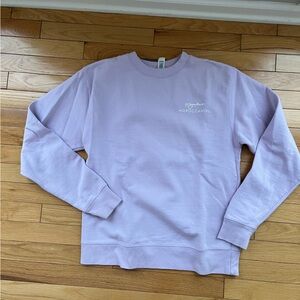 Morganstern’s x Moroccanoil purple crewneck Sweatshirt size S w/graphic on back
